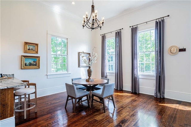 2546 Onzaga St, New Orleans, LA 70119 - dining room with a chandelier, dark wood-type flooring, and ornamental molding