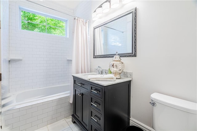 2546 Onzaga St, New Orleans, LA 70119 - bathroom featuring vanity, tiled shower / bath combo, and tile patterned flooring