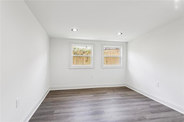 12 Fairlane Dr, Metairie, LA 70003 - spare room with recessed lighting and dark wood-type flooring