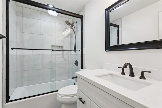 12 Fairlane Dr, Metairie, LA 70003 - bathroom featuring vanity and bath / shower combo with glass door