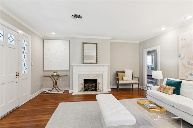 1338 Fern St, New Orleans, LA 70118 - living room with wood finished floors, crown molding, recessed lighting, and a fireplace
