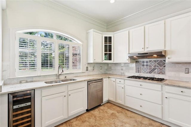 217 Sap Berry Dr, Madisonville, LA 70447 - kitchen featuring stainless steel appliances, wine cooler, healthy amount of natural light, under cabinet range hood, and ornamental molding