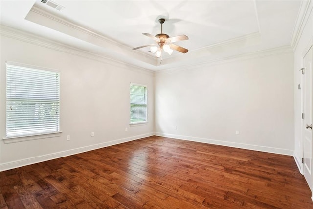 217 Sap Berry Dr, Madisonville, LA 70447 - spare room with a raised ceiling, ornamental molding, hardwood / wood-style flooring, and ceiling fan