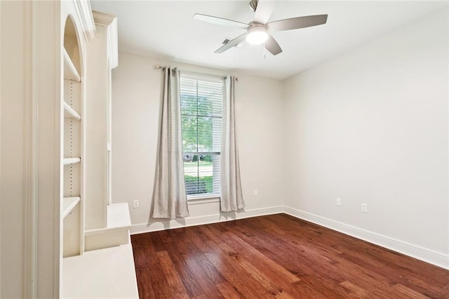 217 Sap Berry Dr, Madisonville, LA 70447 - spare room with dark wood-style flooring and ceiling fan