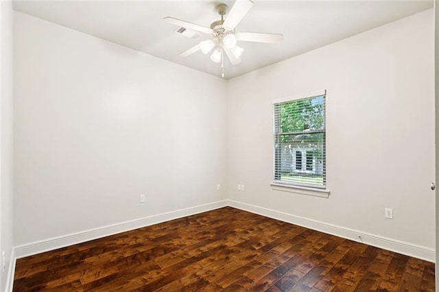 217 Sap Berry Dr, Madisonville, LA 70447 - empty room with dark wood-type flooring and a ceiling fan