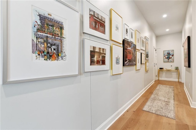 731 St Charles Ave Unit 310, New Orleans, LA 70130 - corridor featuring light wood-style floors and recessed lighting