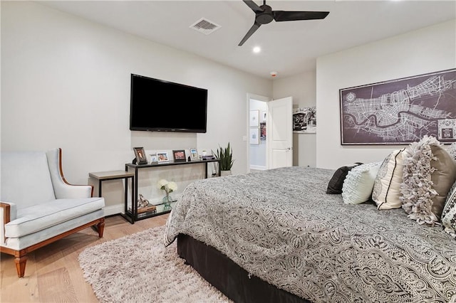 731 St Charles Ave Unit 310, New Orleans, LA 70130 - bedroom featuring recessed lighting, wood finished floors, and a ceiling fan