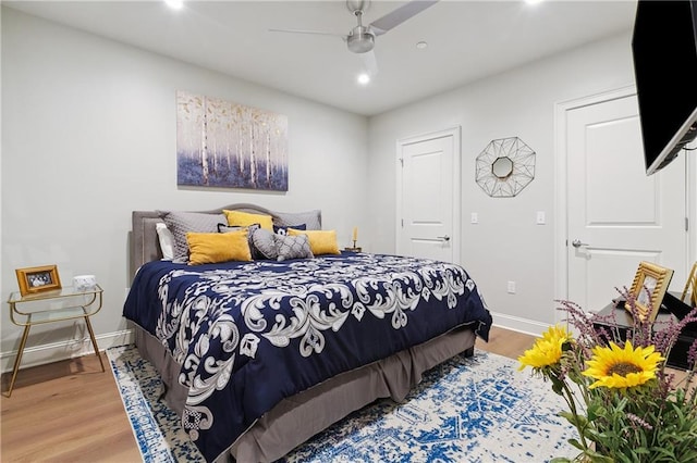731 St Charles Ave Unit 310, New Orleans, LA 70130 - bedroom featuring wood finished floors, recessed lighting, and ceiling fan
