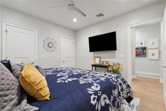 731 St Charles Ave Unit 310, New Orleans, LA 70130 - bedroom featuring wood finished floors, recessed lighting, and ceiling fan