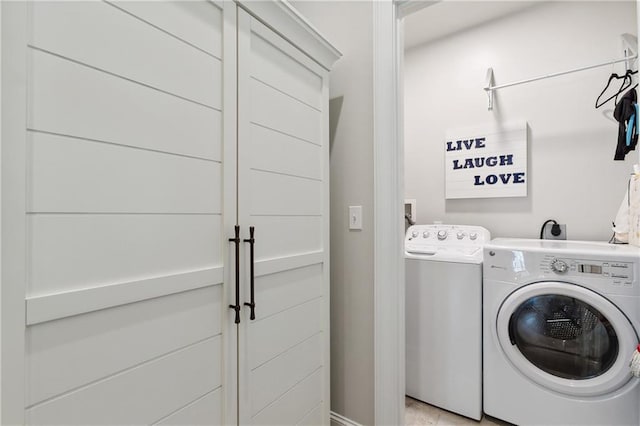 731 St Charles Ave Unit 310, New Orleans, LA 70130 - washroom featuring separate washer and dryer