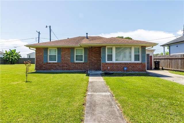 82 Packenham Ave, Chalmette, LA 70043 - bungalow-style house featuring brick siding and roof with shingles