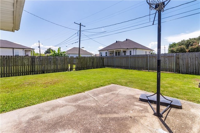 82 Packenham Ave, Chalmette, LA 70043 - fenced backyard with a patio area