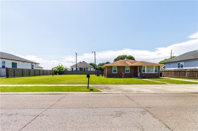 82 Packenham Ave, Chalmette, LA 70043 - view of front of home with brick siding