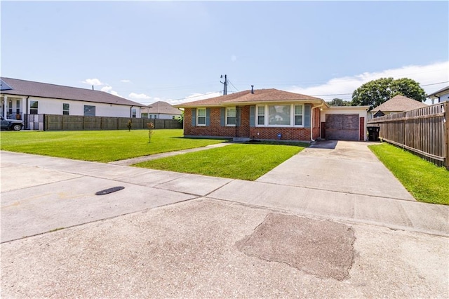 82 Packenham Ave, Chalmette, LA 70043 - view of front facade with concrete driveway and brick siding
