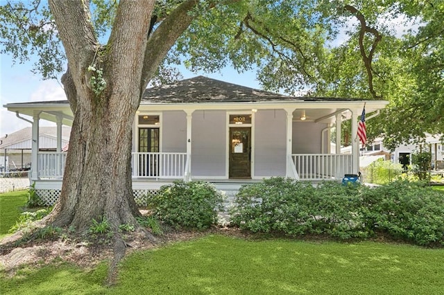 202 Amelia St, Destrehan, LA 70047 - view of front of property with a front yard and covered porch