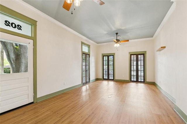 202 Amelia St, Destrehan, LA 70047 - spare room featuring ceiling fan, light wood-type flooring, and ornamental molding