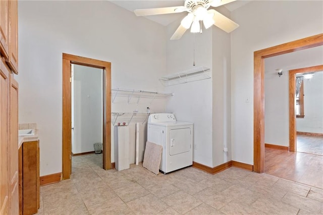 805 Ave A, Marrero, LA 70072 - laundry room featuring washer / dryer, a ceiling fan, and light tile patterned floors