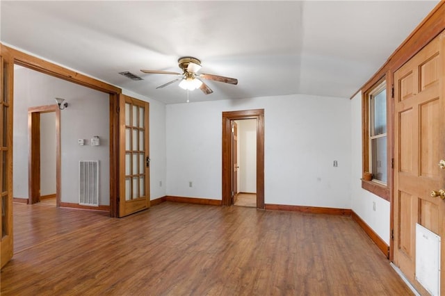 805 Ave A, Marrero, LA 70072 - empty room featuring ceiling fan, wood finished floors, and vaulted ceiling