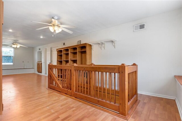 805 Ave A, Marrero, LA 70072 - corridor featuring wood finished floors, recessed lighting, and an upstairs landing