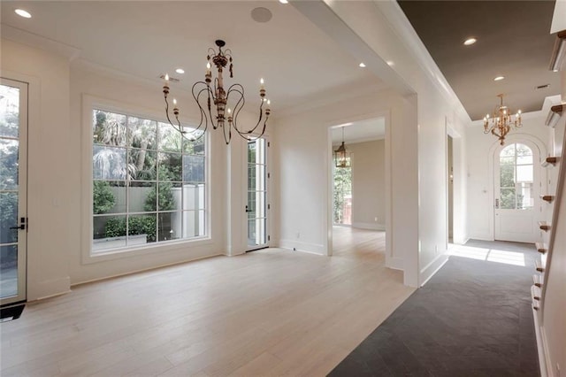 209 Avenue E Ave E, Metairie, LA 70005 - unfurnished dining area featuring a chandelier, crown molding, light wood-style flooring, and recessed lighting