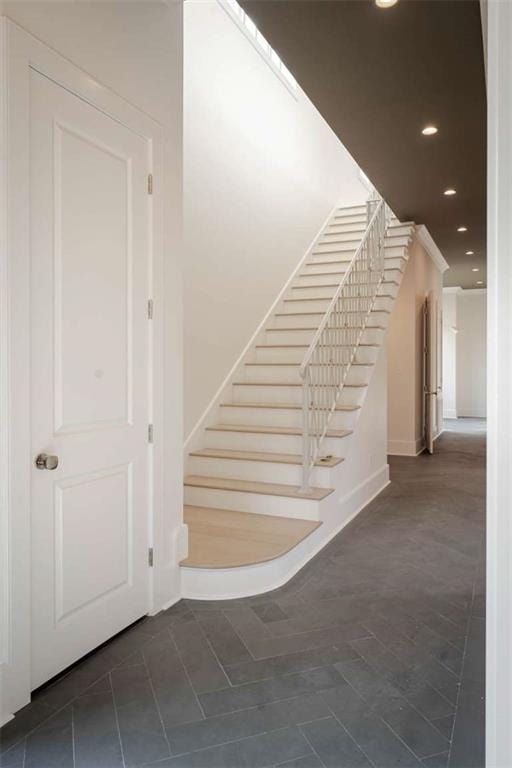 209 Avenue E Ave E, Metairie, LA 70005 - stairs with recessed lighting and tile patterned floors