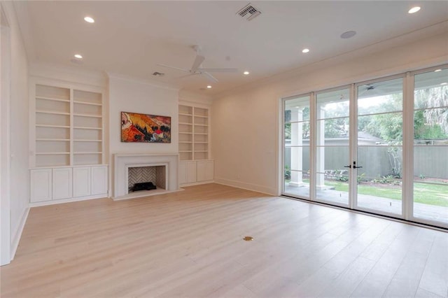 209 Avenue E Ave E, Metairie, LA 70005 - unfurnished living room featuring built in features, plenty of natural light, crown molding, light wood-type flooring, and recessed lighting