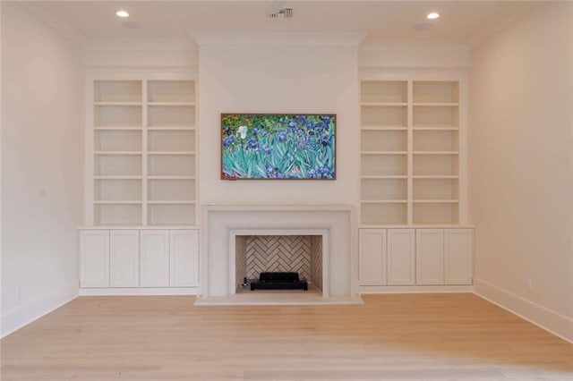 209 Avenue E Ave E, Metairie, LA 70005 - unfurnished living room with built in features, wood finished floors, recessed lighting, and crown molding