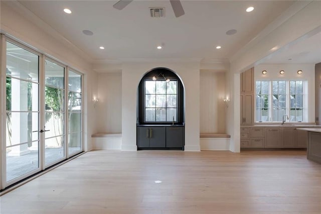 209 Avenue E Ave E, Metairie, LA 70005 - entryway with healthy amount of natural light, light wood finished floors, ceiling fan, recessed lighting, and crown molding
