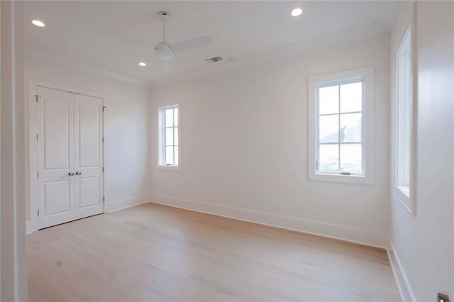 209 Avenue E Ave E, Metairie, LA 70005 - unfurnished bedroom featuring light wood-style floors, recessed lighting, a closet, and a ceiling fan