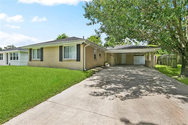 2900 Somerset Dr, New Orleans, LA 70131 - ranch-style house with driveway, brick siding, and a carport