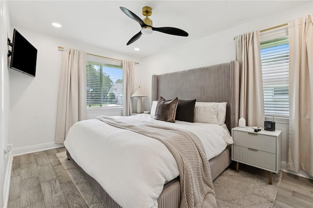 2900 Somerset Dr, New Orleans, LA 70131 - bedroom featuring light wood-style flooring, ceiling fan, and recessed lighting