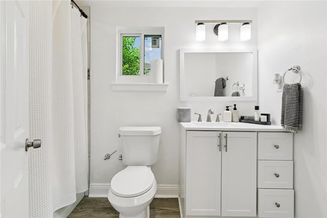 2900 Somerset Dr, New Orleans, LA 70131 - full bath featuring vanity, wood finished floors, and a shower with curtain