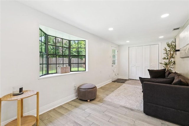 2900 Somerset Dr, New Orleans, LA 70131 - living area with healthy amount of natural light, recessed lighting, and wood finished floors