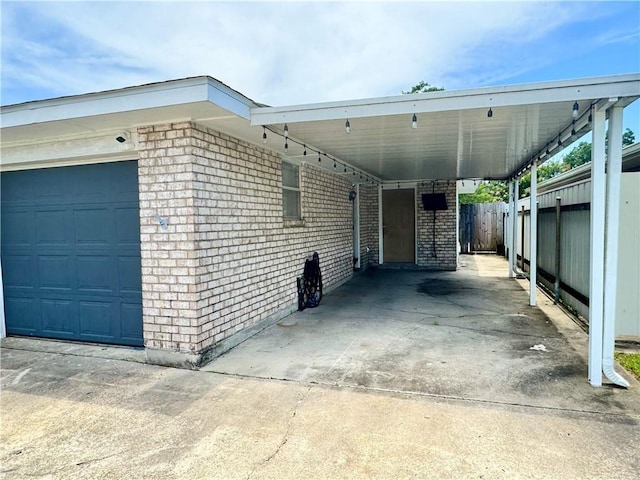 3509 Decomine Dr, Chalmette, LA 70043 - view of parking / parking lot featuring concrete driveway and an attached carport