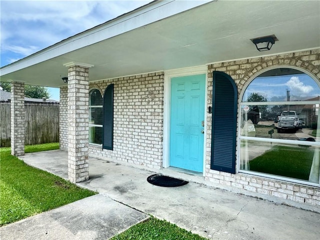 3509 Decomine Dr, Chalmette, LA 70043 - property entrance featuring brick siding and covered porch