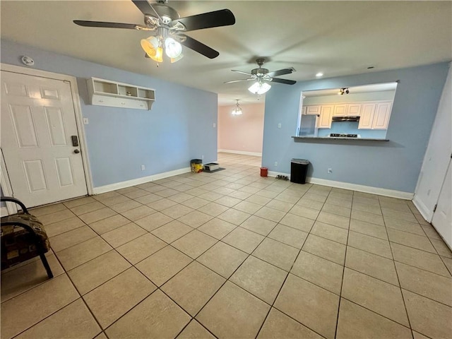 3509 Decomine Dr, Chalmette, LA 70043 - unfurnished living room featuring a ceiling fan and light tile patterned floors