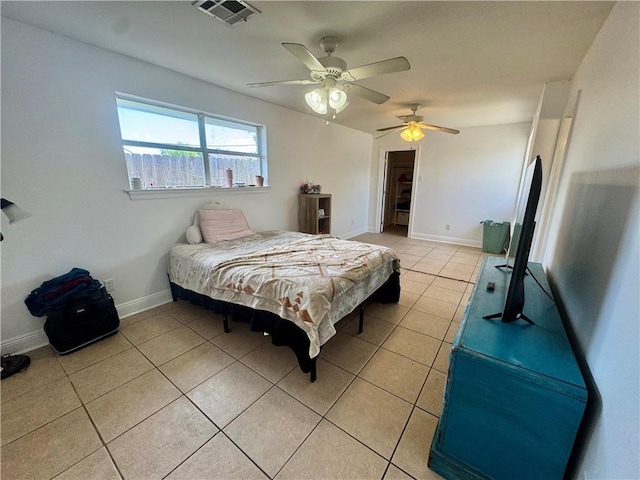 3509 Decomine Dr, Chalmette, LA 70043 - bedroom featuring light tile patterned flooring and a ceiling fan