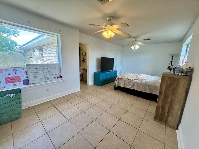 3509 Decomine Dr, Chalmette, LA 70043 - bedroom featuring light tile patterned flooring and a ceiling fan