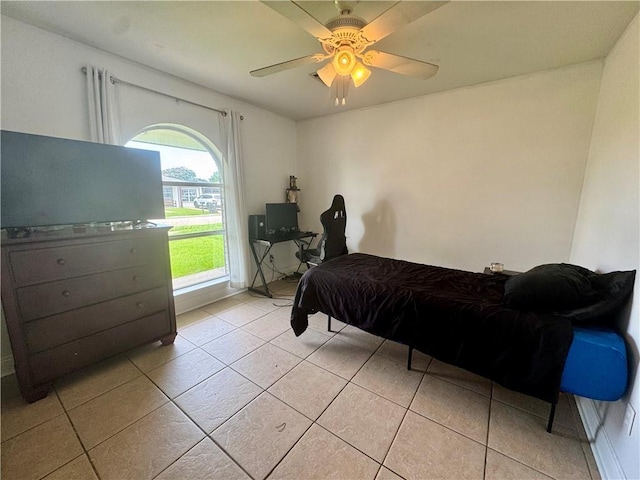 3509 Decomine Dr, Chalmette, LA 70043 - bedroom featuring light tile patterned floors and a ceiling fan