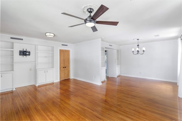 53 Beverly Garden Dr, Metairie, LA 70001 - empty room with a chandelier, ceiling fan, built in features, wood finished floors, and ornamental molding
