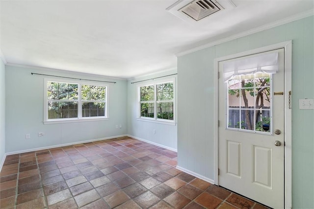 53 Beverly Garden Dr, Metairie, LA 70001 - foyer entrance featuring crown molding and dark stone finish flooring