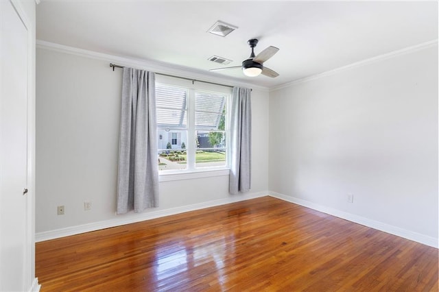 53 Beverly Garden Dr, Metairie, LA 70001 - empty room with crown molding, wood finished floors, and a ceiling fan