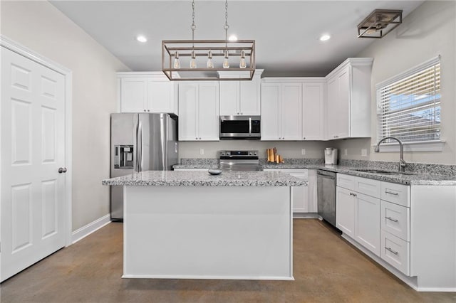 12464 Morgan Creek Ln Unit A, Hammond, LA 70403 - kitchen with appliances with stainless steel finishes, finished concrete flooring, white cabinets, recessed lighting, and light stone countertops