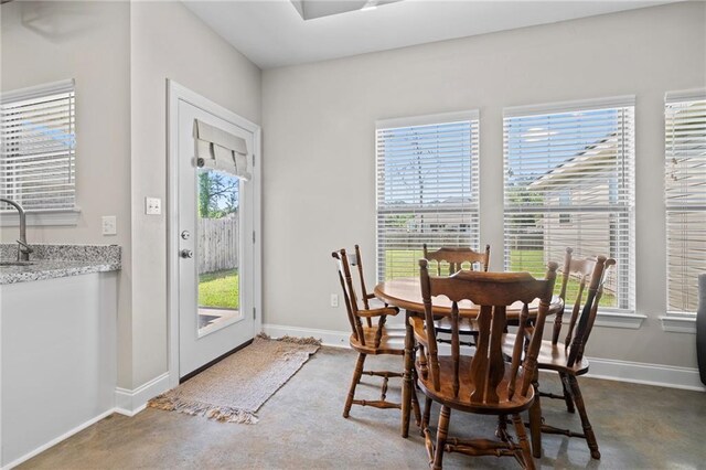 12464 Morgan Creek Ln Unit A, Hammond, LA 70403 - dining space featuring baseboards