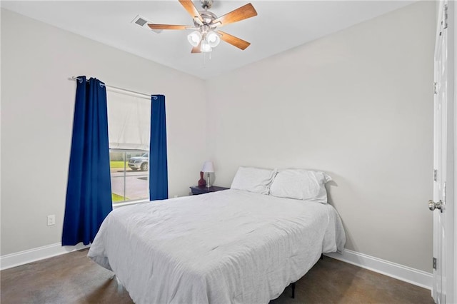 12464 Morgan Creek Ln Unit A, Hammond, LA 70403 - bedroom featuring baseboards and a ceiling fan