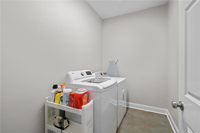 12464 Morgan Creek Ln Unit A, Hammond, LA 70403 - washroom featuring washer and clothes dryer and baseboards