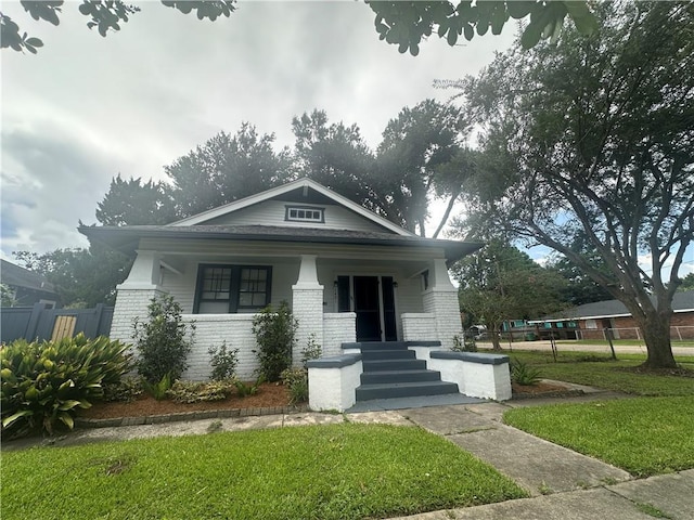 1401 Jefferson St, Gretna, LA 70053 - view of front of property featuring a porch and brick siding
