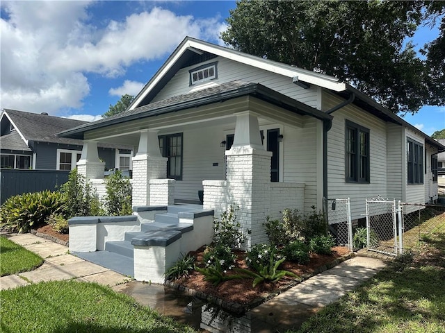 1401 Jefferson St, Gretna, LA 70053 - view of front facade featuring covered porch