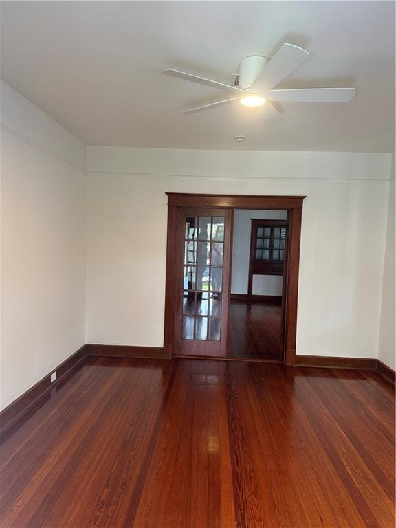1401 Jefferson St, Gretna, LA 70053 - empty room with wood finished floors and ceiling fan