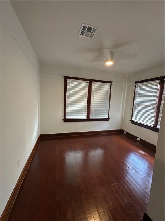 1401 Jefferson St, Gretna, LA 70053 - spare room with wood finished floors and a ceiling fan